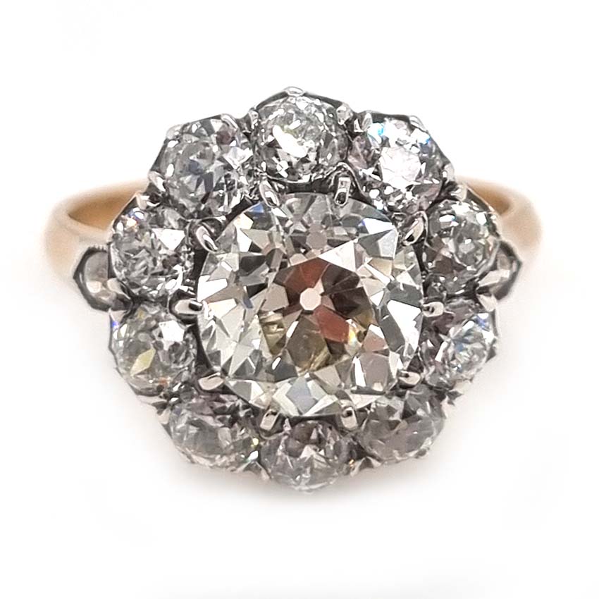 Antique Old Mine Cut Diamond Cluster Engagement Ring, over 4cts, 2.33ct old mine-cut diamond surrounded by 2cts of old-cut diamonds in platinum and 18ct yellow gold