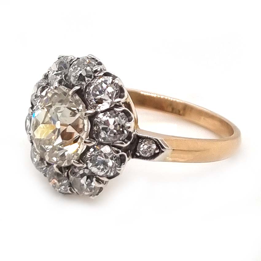 Antique Old Mine Cut Diamond Cluster Engagement Ring, over 4cts, 2.33ct old mine-cut diamond surrounded by 2cts of old-cut diamonds in platinum and 18ct yellow gold