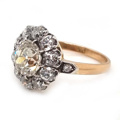 Antique Old Mine Cut Diamond Cluster Engagement Ring, over 4cts, 2.33ct old mine-cut diamond surrounded by 2cts of old-cut diamonds in platinum and 18ct yellow gold