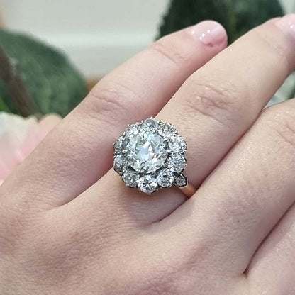 Antique Old Mine Cut Diamond Cluster Engagement Ring, over 4cts, 2.33ct old mine-cut diamond surrounded by 2cts of old-cut diamonds in platinum and 18ct yellow gold