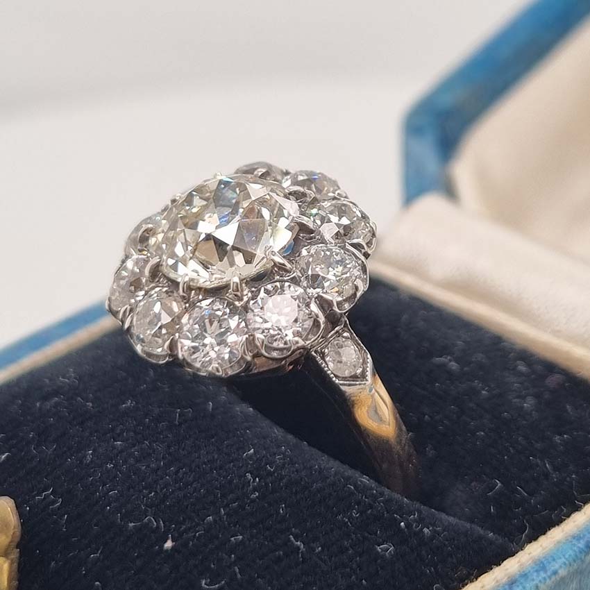 Antique Old Mine Cut Diamond Cluster Engagement Ring, over 4cts, 2.33ct old mine-cut diamond surrounded by 2cts of old-cut diamonds in platinum and 18ct yellow gold