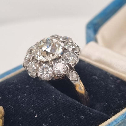 Antique Old Mine Cut Diamond Cluster Engagement Ring, over 4cts, 2.33ct old mine-cut diamond surrounded by 2cts of old-cut diamonds in platinum and 18ct yellow gold
