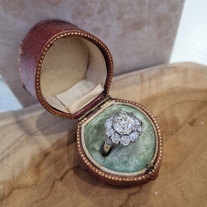 Antique Old Mine Cut Diamond Cluster Engagement Ring, over 4cts, 2.33ct old mine-cut diamond surrounded by 2cts of old-cut diamonds in platinum and 18ct yellow gold