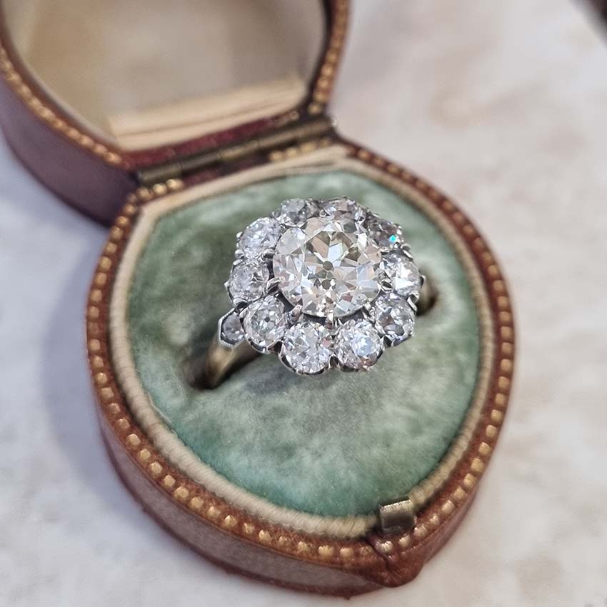 Antique Old Mine Cut Diamond Cluster Engagement Ring, over 4cts, 2.33ct old mine-cut diamond surrounded by 2cts of old-cut diamonds in platinum and 18ct yellow gold