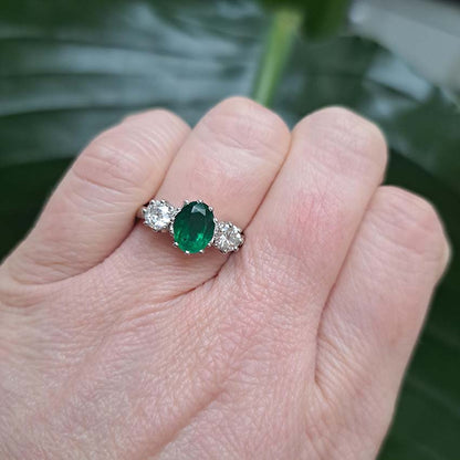 1.30ct Oval Emerald and Diamond Three Stone Engagement Ring