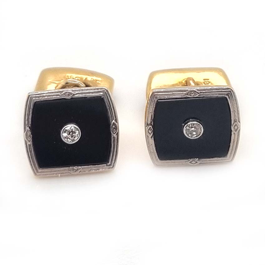 Art Deco Black Onyx and Diamond Cufflinks, black onyx plaques with central diamonds set in platinum to yellow gold