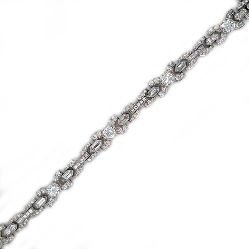 1950's Vintage Diamond X Cross Link Bracelet, 9 carat total, set with 9 carats of transitional-cut, old-cut, square princess-cut and long hexagonal facetted cut diamonds in 14ct white gold