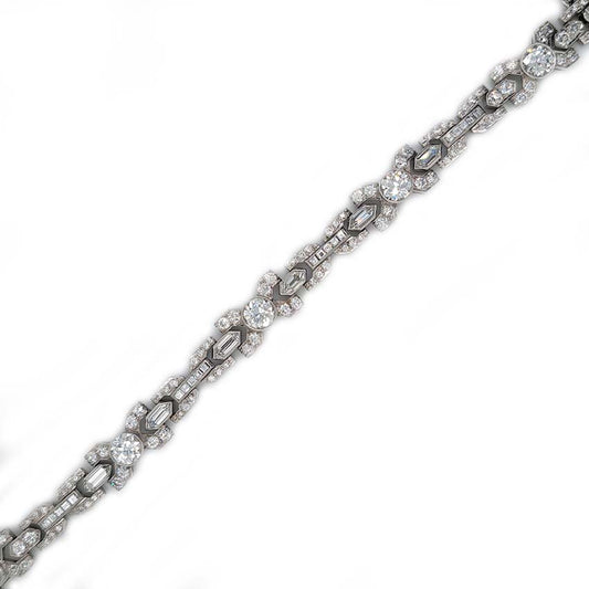 1950's Vintage Diamond X Cross Link Bracelet, 9 carat total, set with 9 carats of transitional-cut, old-cut, square princess-cut and long hexagonal facetted cut diamonds in 14ct white gold