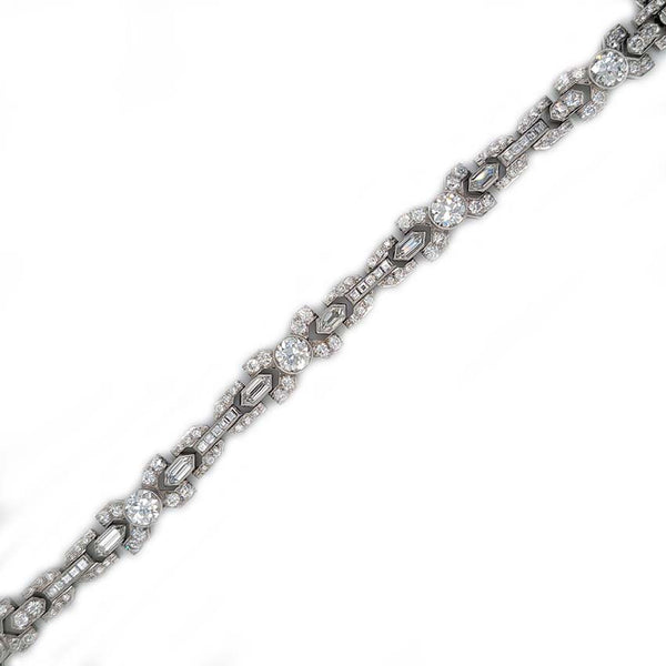 1950's Vintage Diamond X Cross Link Bracelet, 9 carat total, set with 9 carats of transitional-cut, old-cut, square princess-cut and long hexagonal facetted cut diamonds in 14ct white gold