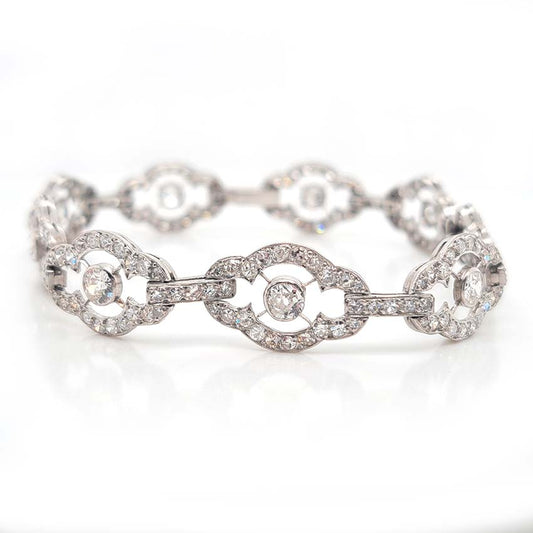 Antique French 2ct Diamond Cluster Link Bracelet, floral quatrefoil links set with an estimated 2 carats of old-cut diamonds in platinum and 18ct white gold