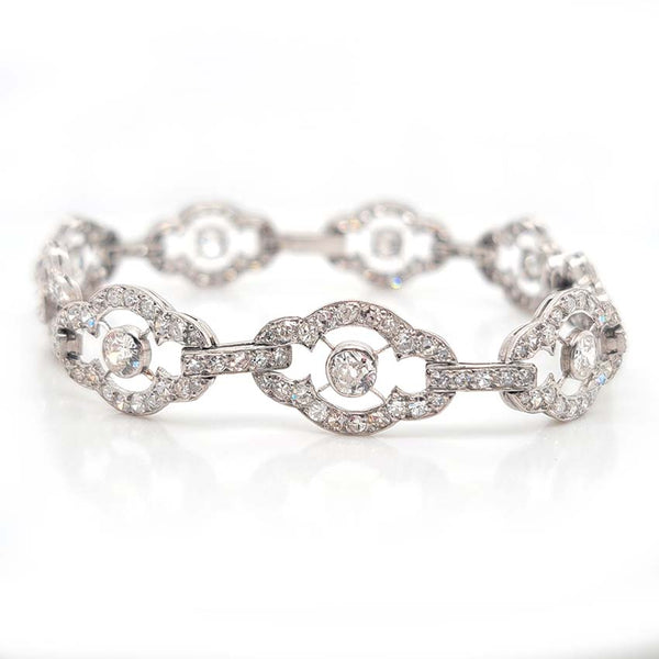 Antique French 2ct Diamond Cluster Link Bracelet, floral quatrefoil links set with an estimated 2 carats of old-cut diamonds in platinum and 18ct white gold