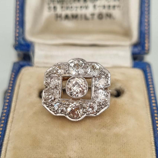 Art Deco 1.5ct Old Cut Diamond Cluster Panel Ring, set with an estimated 1.5 carats of old mine-cut diamonds in 18ct yellow gold to 18ct white gold band