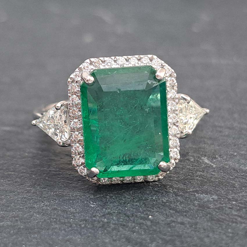 3.85ct Emerald and Diamond Cluster Ring with Trillion Diamond Sides