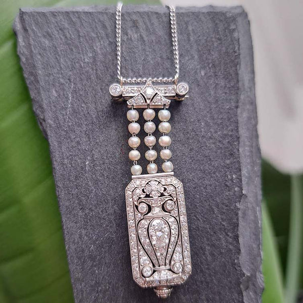Tiffany and Co Art Deco 2.10ct Diamond Natural Pearl and Platinum Watch Pendant, Circa 1925. Movement signed C H Meylan