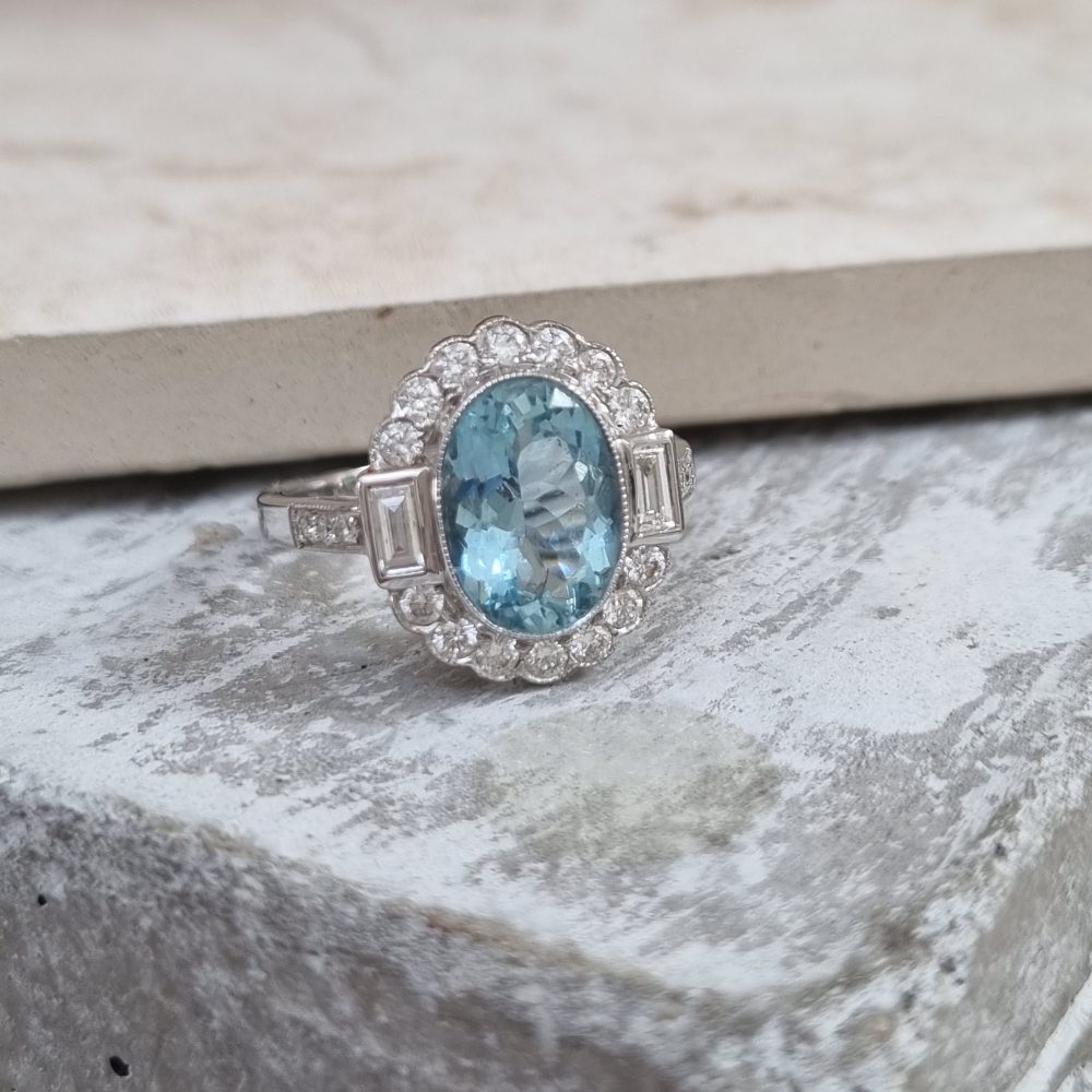 Oval Cut 2.10ct Aquamarine and Diamond Cluster Engagement Ring
