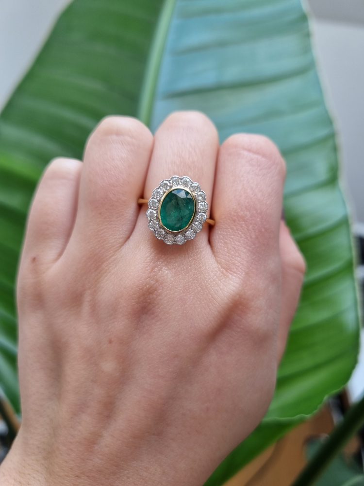 2.25ct Oval Emerald and Diamond Cluster Engagement Ring in 18ct Yellow Gold