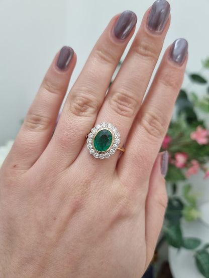 2.25ct Oval Emerald and Diamond Cluster Engagement Ring in 18ct Yellow Gold