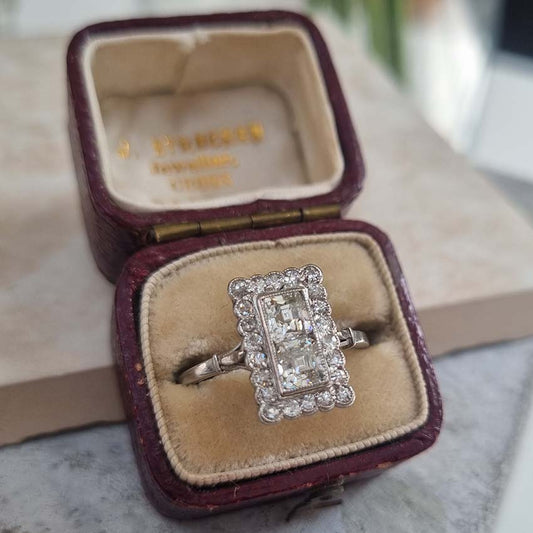 Art Deco 1ct Square Diamond Cluster Plaque Ring, Two vertical square step-cut diamonds surrounded by border of old-cut diamonds in platinum