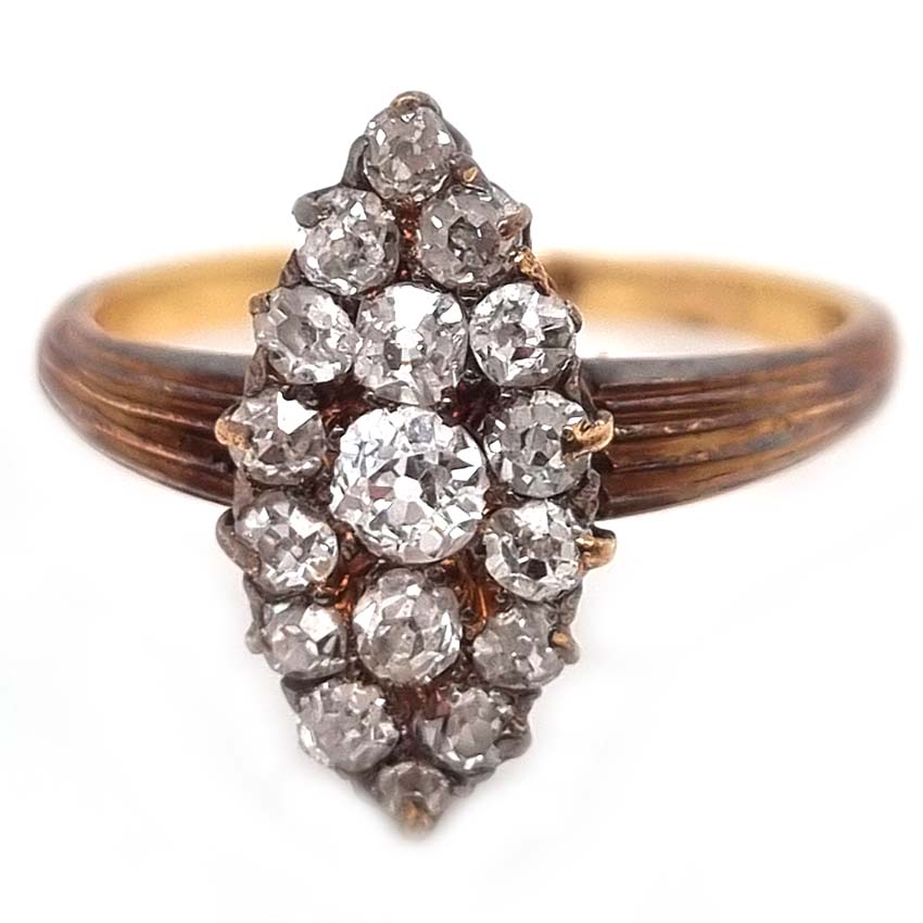 Victorian Antique Old Cut Diamond Navette Cluster Ring, composed of old mine-cut diamond arranged in an eye-catching navette shaped cluster in silver upon yellow gold. Circa 1860.