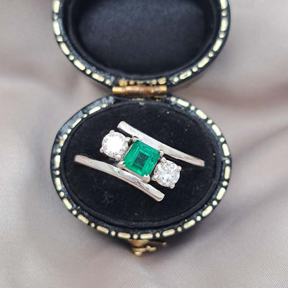Emerald and Diamond Crossover Three Stone Ring