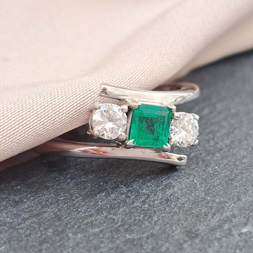 Emerald and Diamond Crossover Three Stone Ring