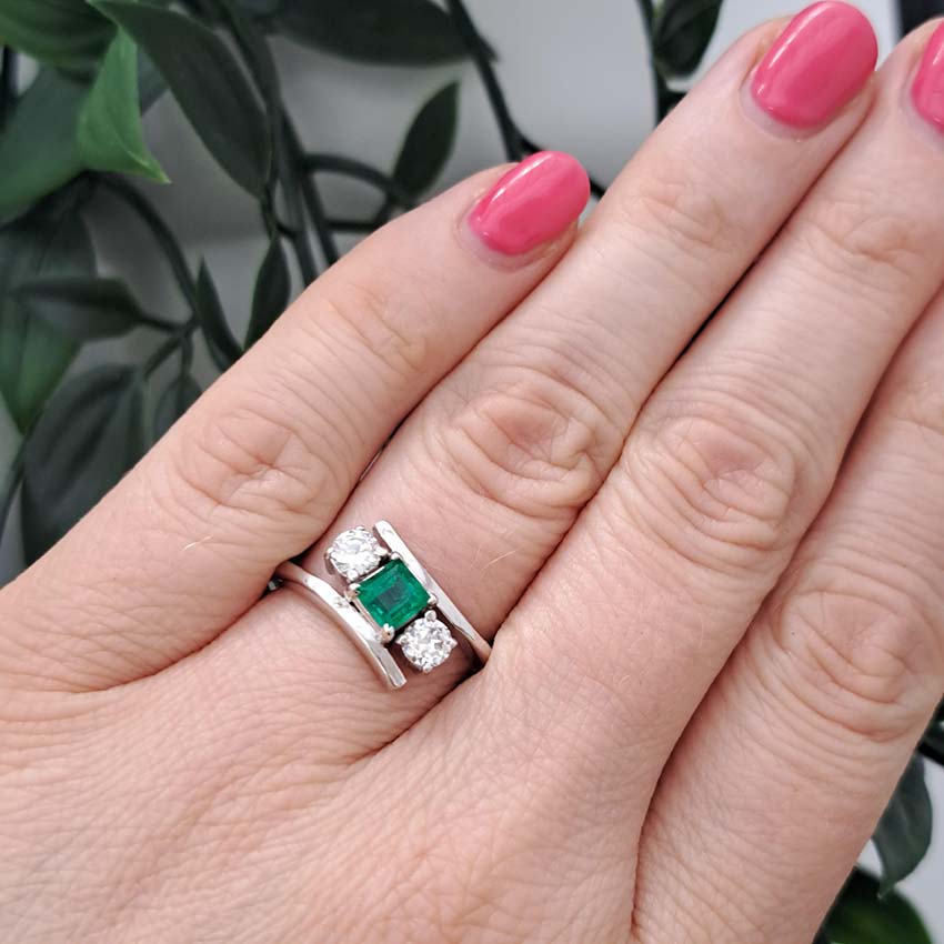 Emerald and Diamond Crossover Three Stone Ring