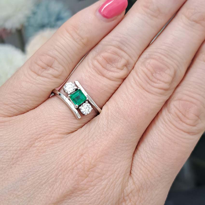 Emerald and Diamond Crossover Three Stone Ring