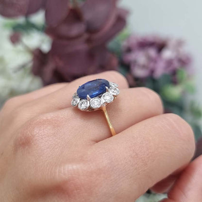 4.62ct Oval Sapphire and Diamond Flower Cluster Engagement Ring