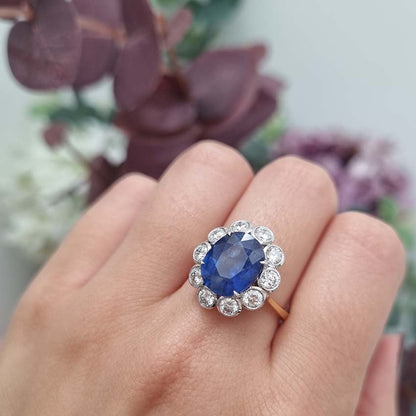 4.62ct Oval Sapphire and Diamond Cluster Engagement Ring