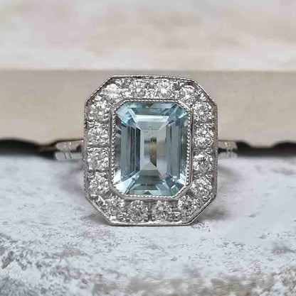 1.75ct Emerald Cut Aquamarine and Diamond Cluster Ring