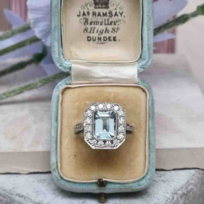 1.75ct Emerald Cut Aquamarine and Diamond Cluster Ring