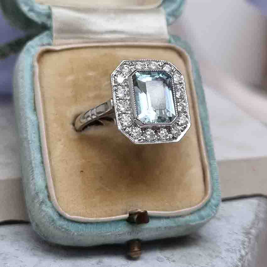 1.75ct Emerald Cut Aquamarine and Diamond Cluster Ring