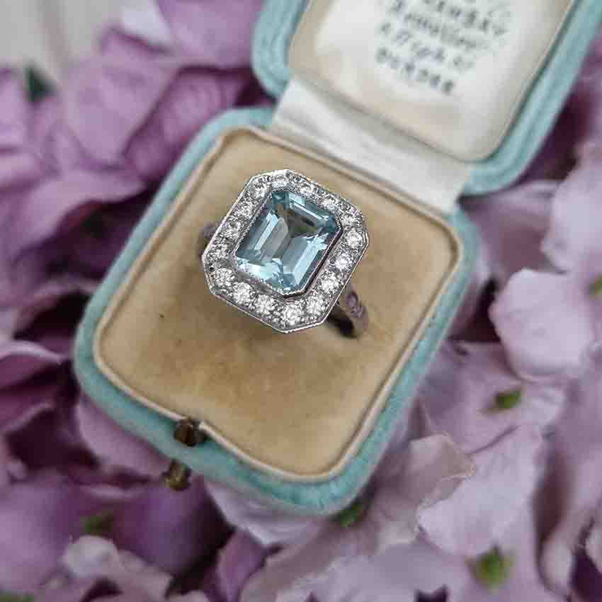 1.75ct Emerald Cut Aquamarine and Diamond Cluster Ring