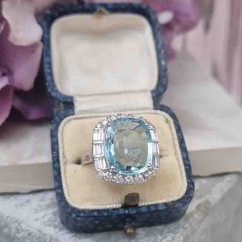 Contemporary 4.64ct Cushion Cut Aquamarine and Diamond Cluster Ring