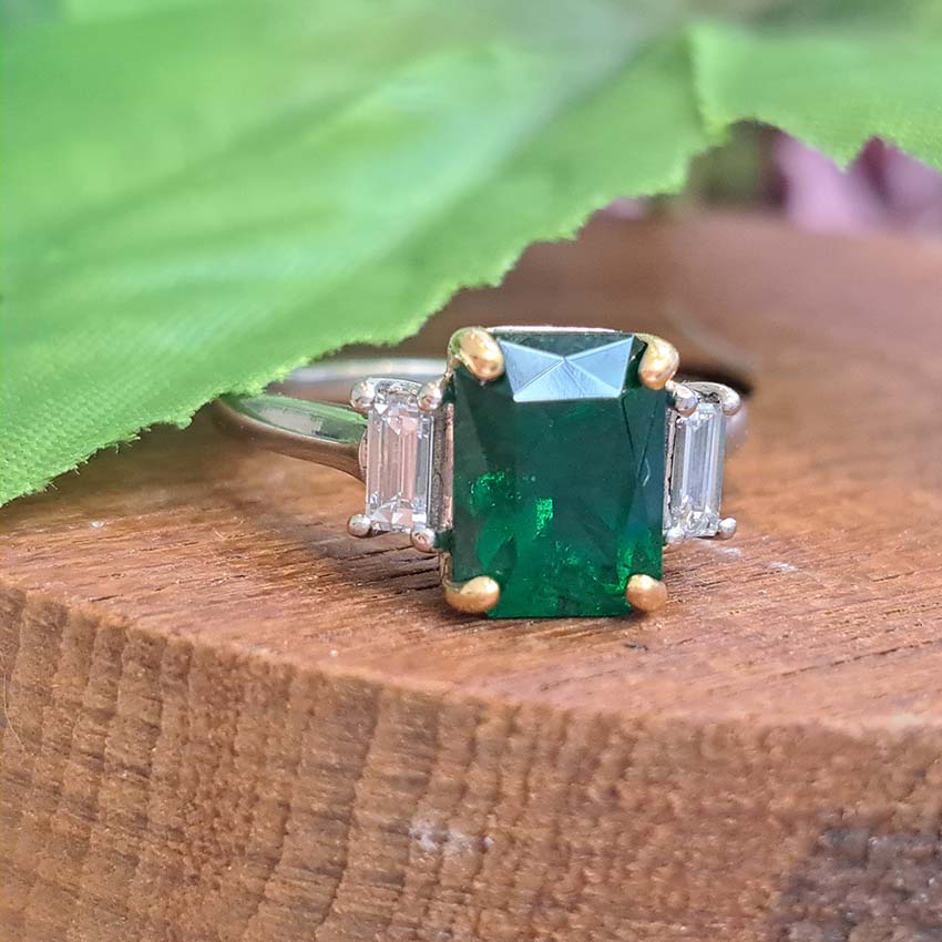 2.12ct Emerald Cut Emerald and Baguette Diamond Trilogy Ring