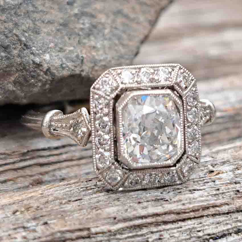 Vintage 1ct Cushion Shape Old Mine Cut Diamond Cluster Engagement Ring in Platinum