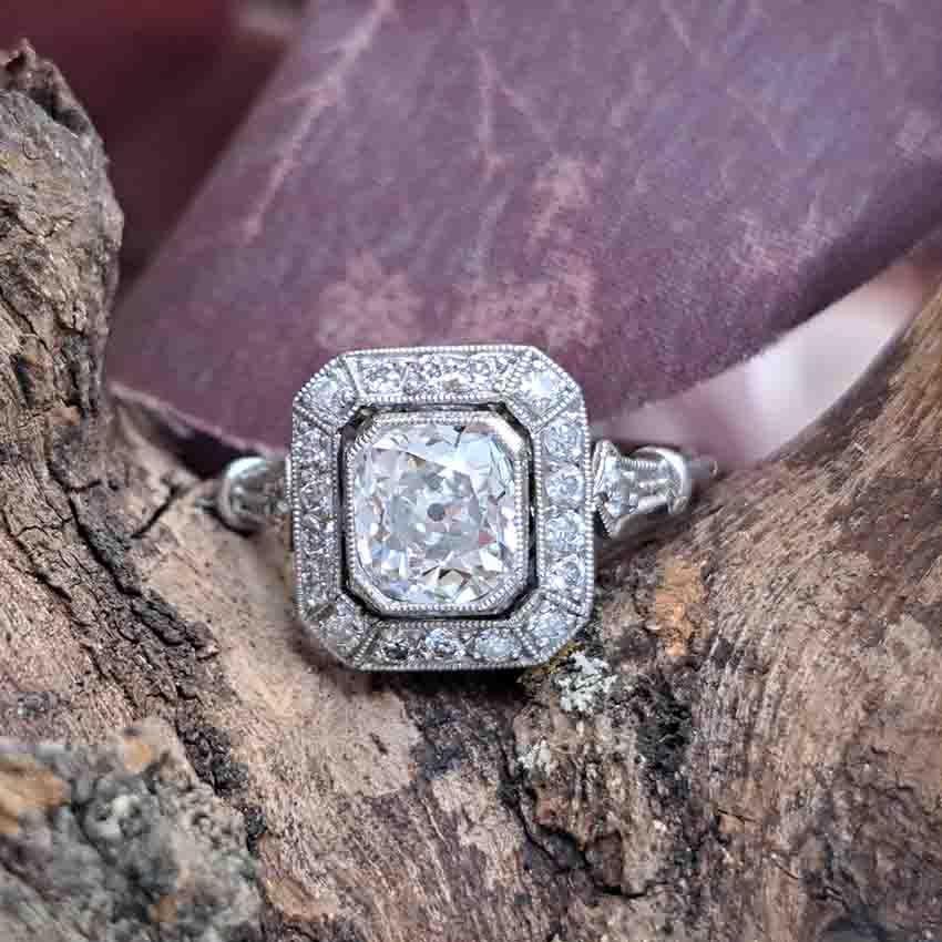 Vintage 1ct Cushion Shape Old Mine Cut Diamond Cluster Engagement Ring in Platinum