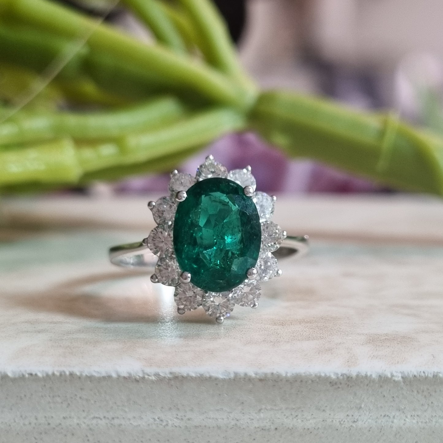 2.16ct Oval Emerald and Diamond Cluster Ring