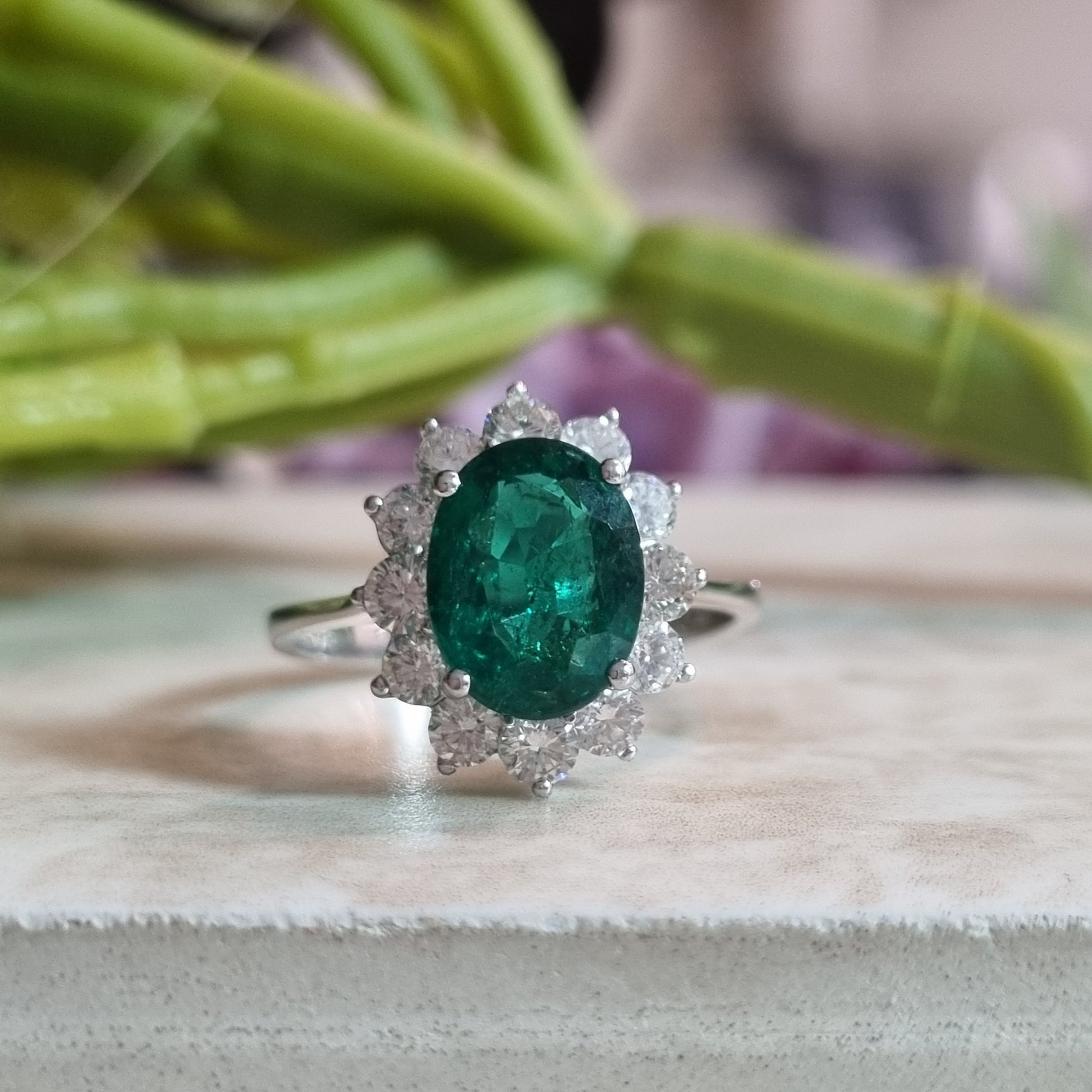 2.16ct Oval Emerald and Diamond Cluster Ring
