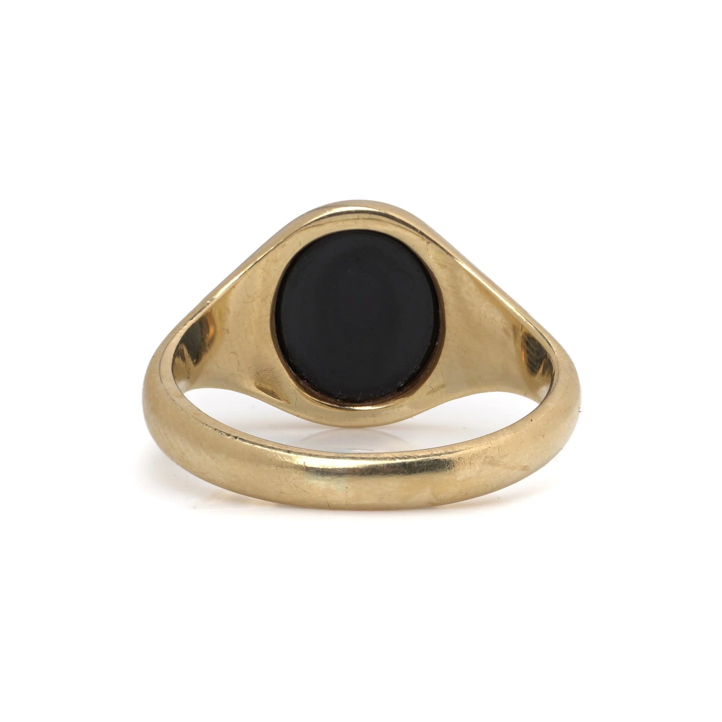 A yellow gold signet ring with an oval onyx masonic plaque