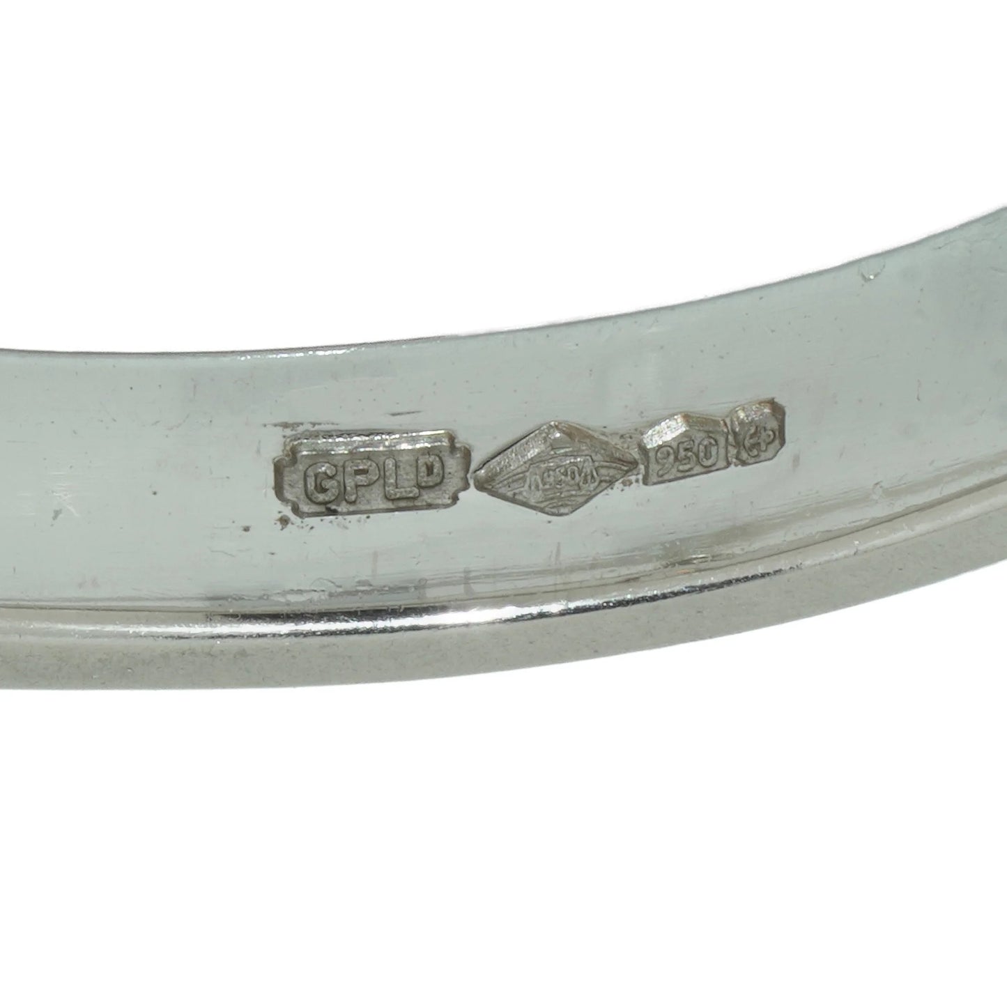 Close-up of a platinum hallmark inside a ring shank
