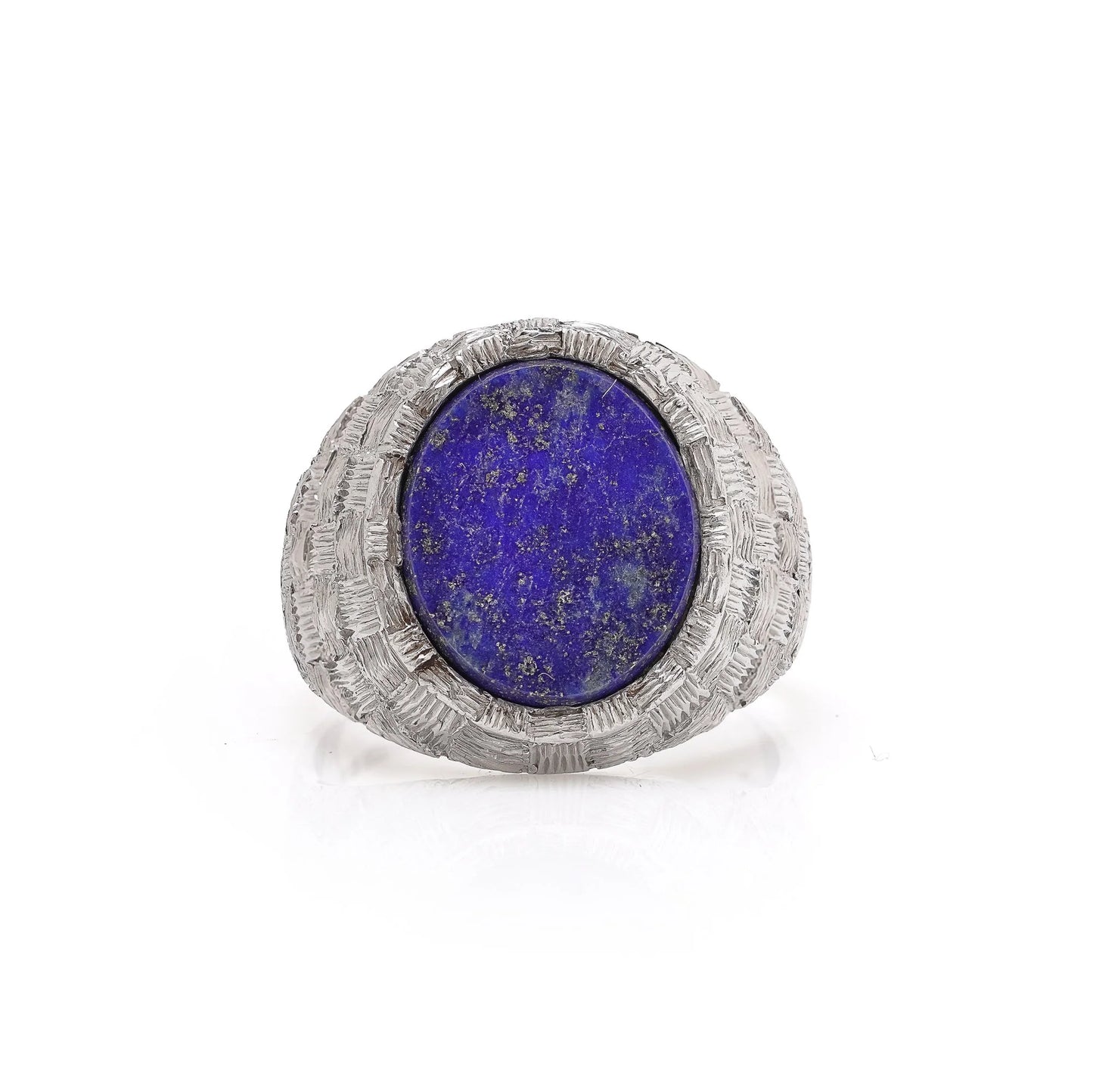 A white gold textured ring with an oval lapis lazuli