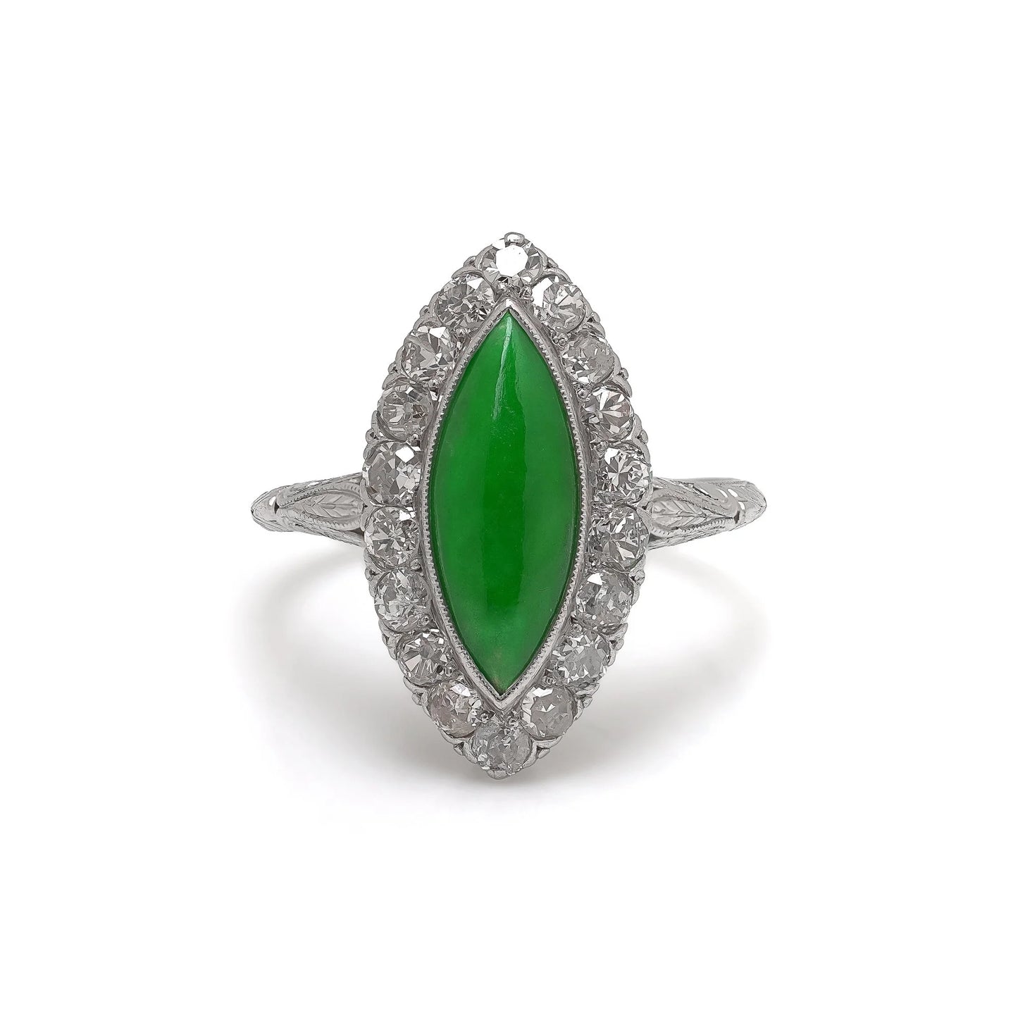 A jade and diamond navette shaped cluster ring in platinum