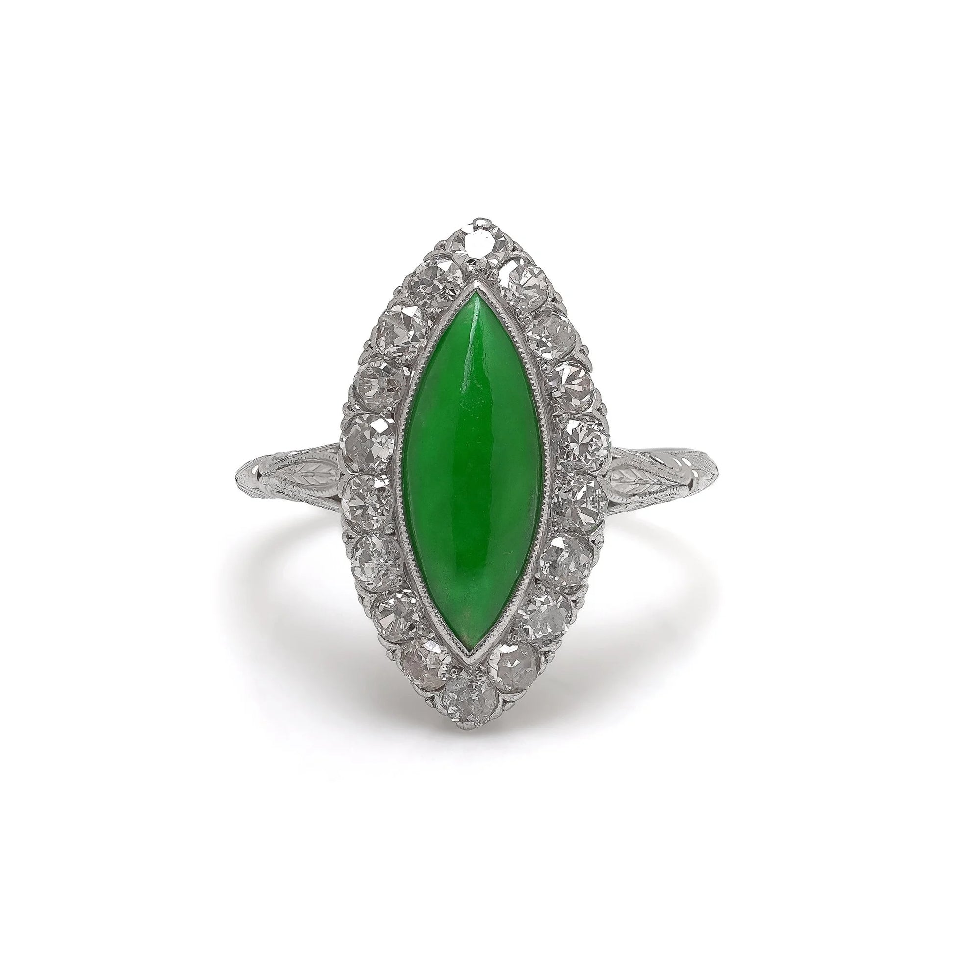A jade and diamond navette shaped cluster ring in platinum