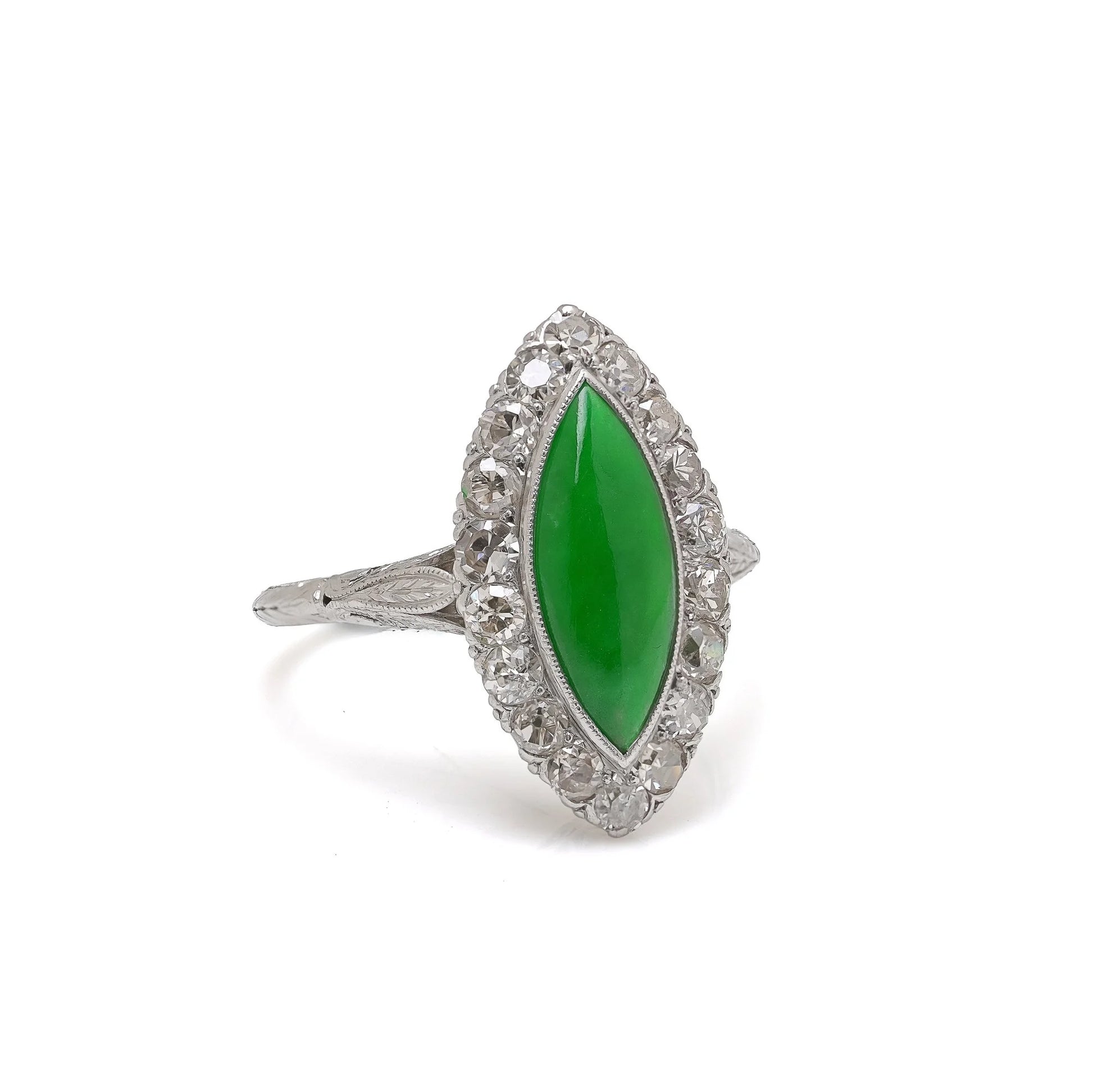 A jade and diamond navette shaped cluster ring in platinum