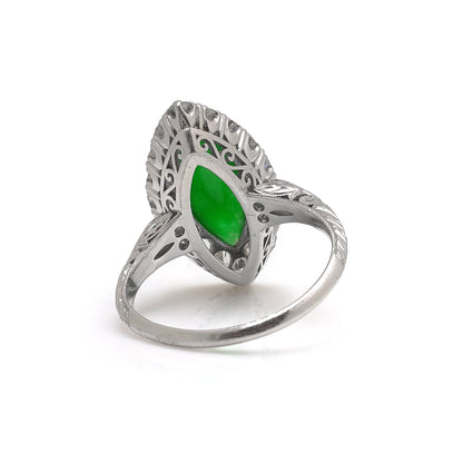 A jade and diamond navette shaped cluster ring in platinum