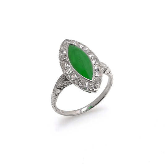 A jade and diamond navette shaped cluster ring in platinum