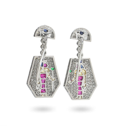 A pair of Eye of Horus drop earrings set with diamonds, rubies, emeralds, blue sapphires and yellow sapphires, in platinum