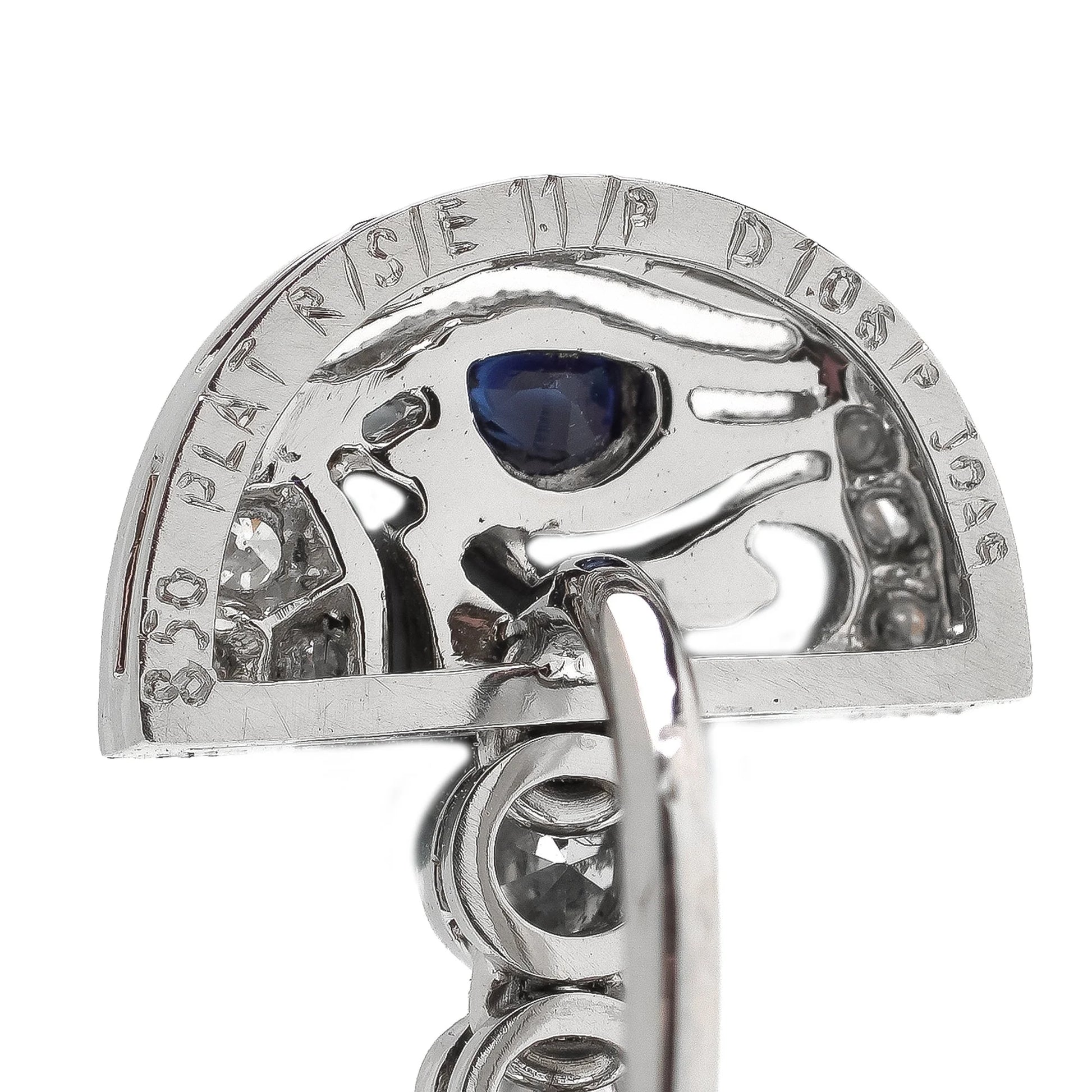 A pair of Eye of Horus drop earrings set with diamonds, rubies, emeralds, blue sapphires and yellow sapphires, in platinum