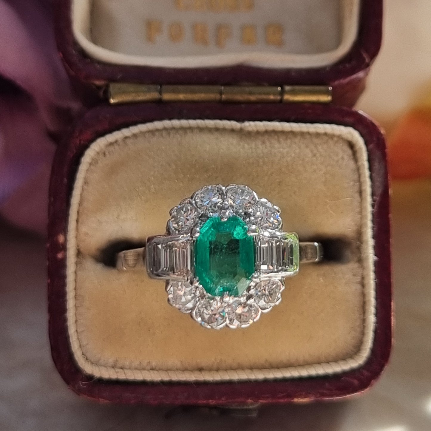 Emerald and Baguette Diamond Cluster Engagement Ring